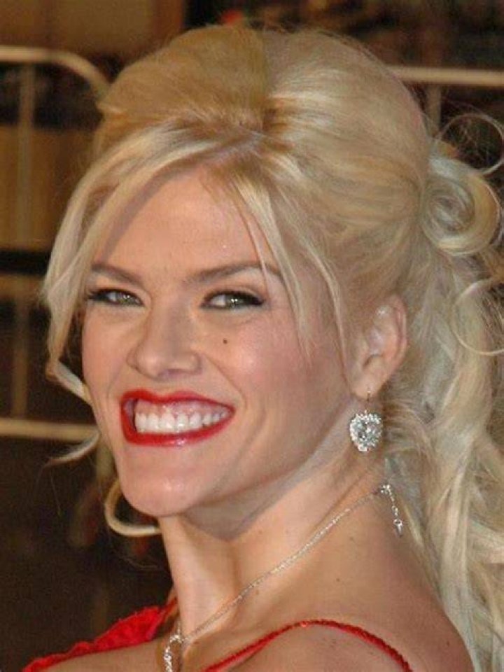 Anna Nicole Smith receives a proclamation from the City of West