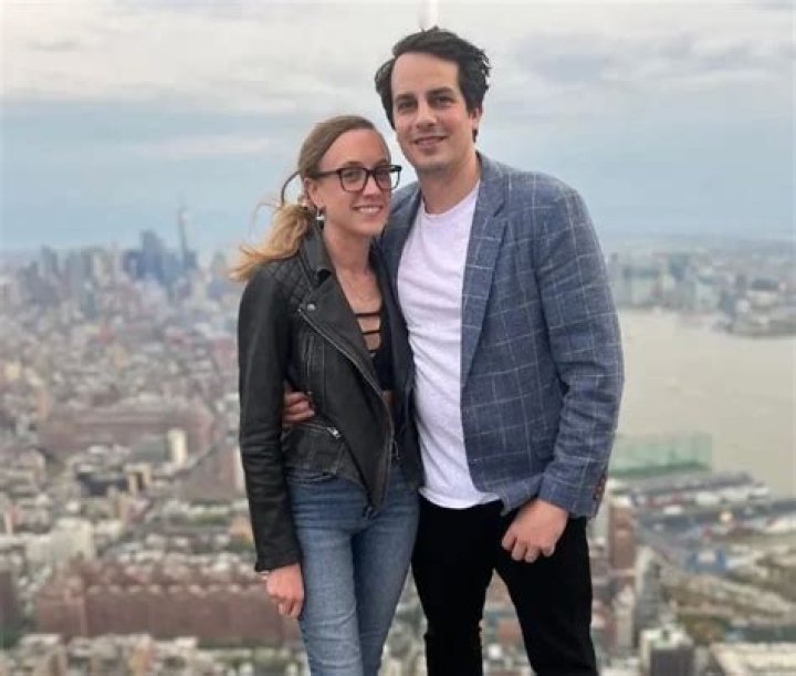 Cameron Friscia with his wife