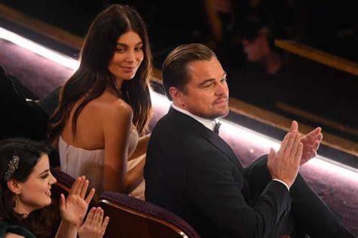 Camila Morrone and Leonardo DiCaprio in France together wearing coats