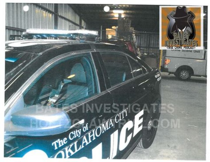 Daniel Holtzclaw With Patrol Car
