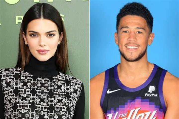 Devin Booker at his girlfriend Kendall Jenner's playing with her dog