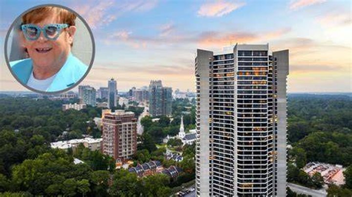 Does Elton John still own a condo in Atlanta?