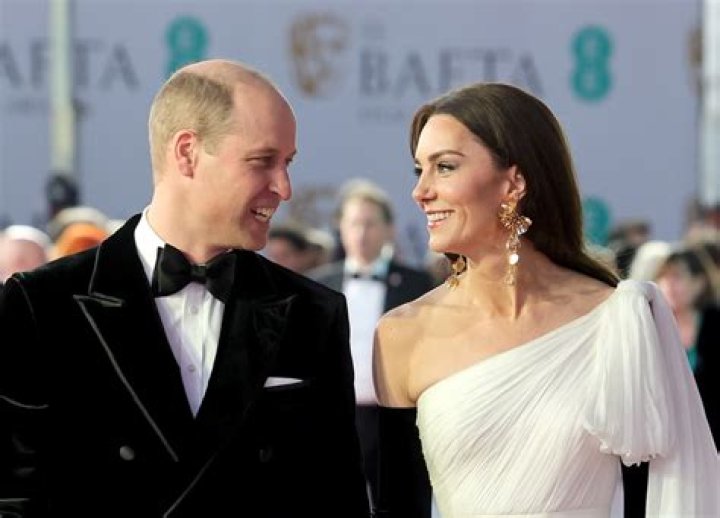 Kate Middleton and Prince William Kiss in Rare PDA Photo
