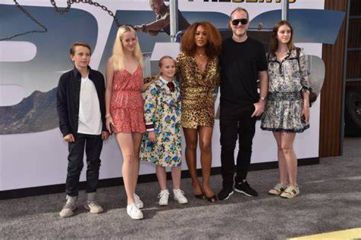 Maximillion Cooper with his children and wife Eve