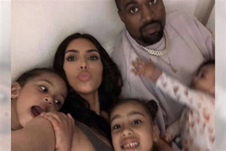 Psalm West with his dad mom and siblings