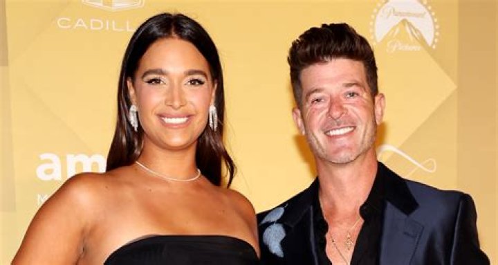 Robin Thicke with his ex wife