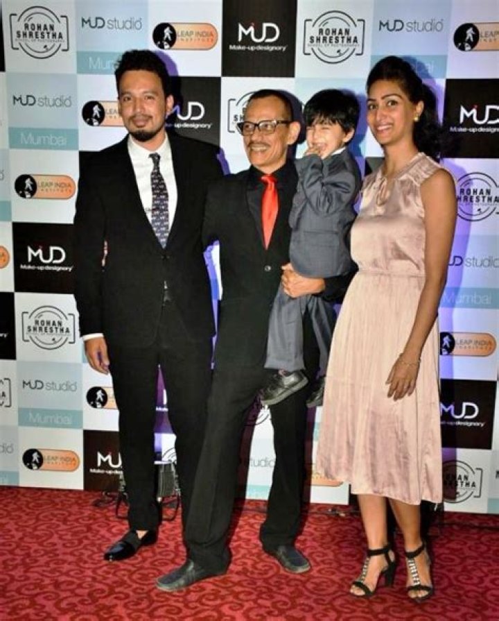 Rohan Shrestha with his father and brother