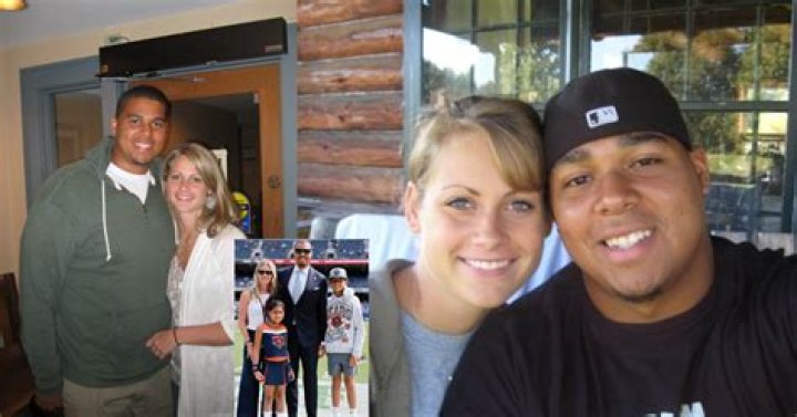 Ryan poles with his wife