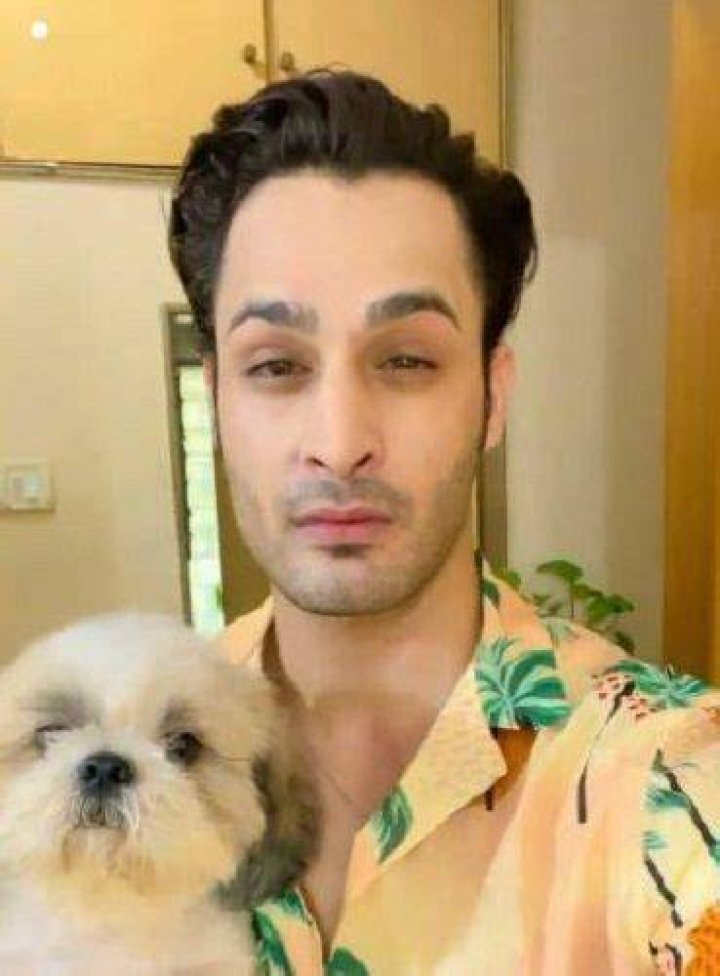 Umar Riaz and his pet dog