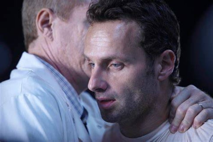 What did Edwin Jenner whisper to Rick Grimes?