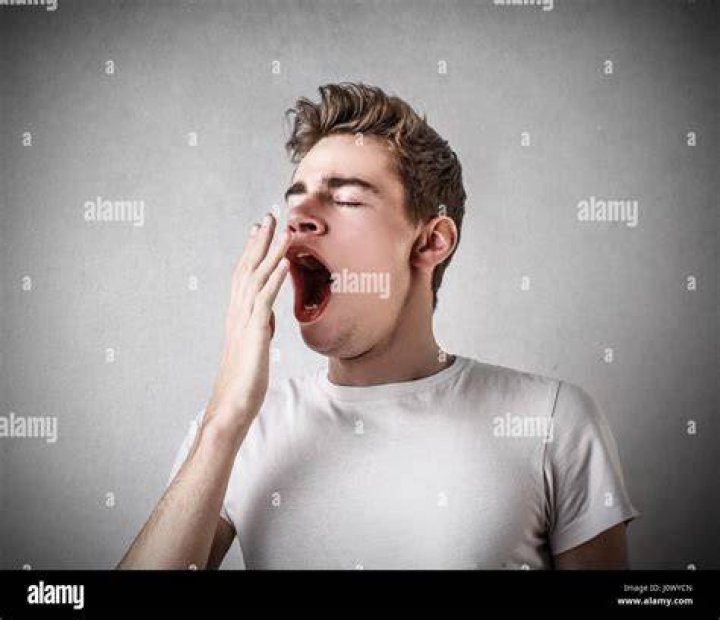 Young Man Yawning